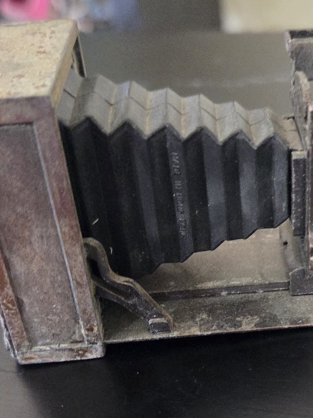 vintage 2" metal folding camera pencil sharpener.